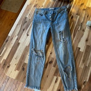 Free people embroidered distressed jeans.